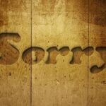 Schild "Sorry" Schild "Sorry"
